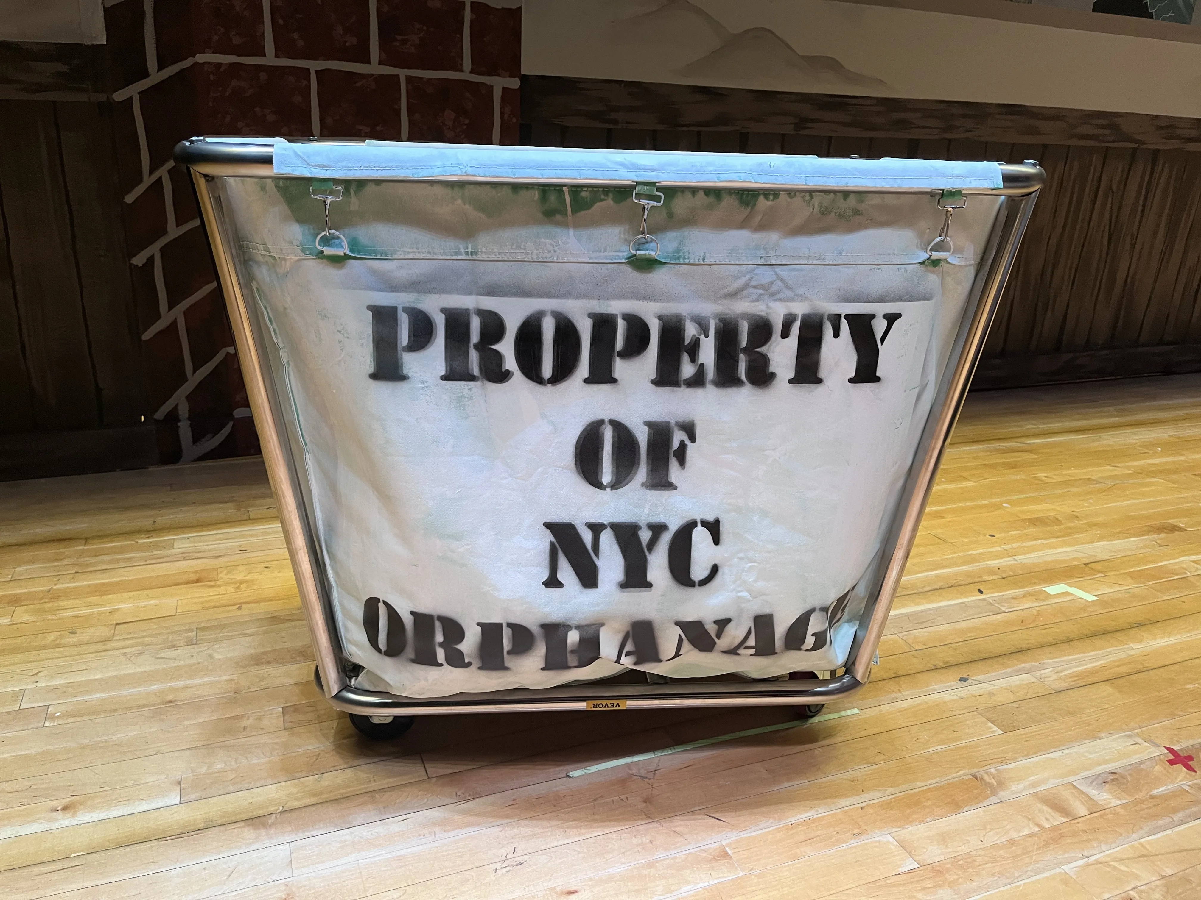The NYC Orphanage laundry cart prop