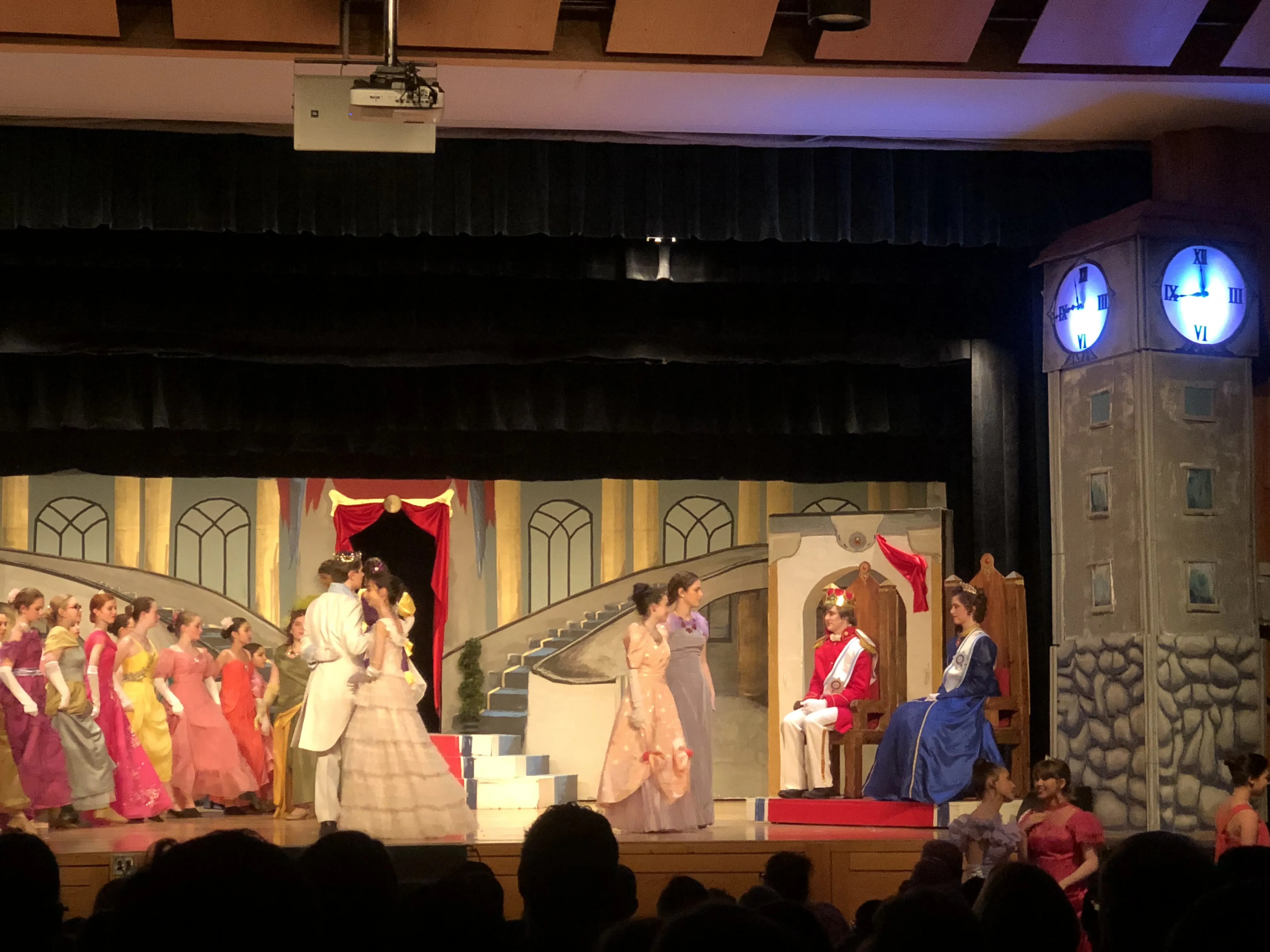 The full court scene with the clock tower visible at right