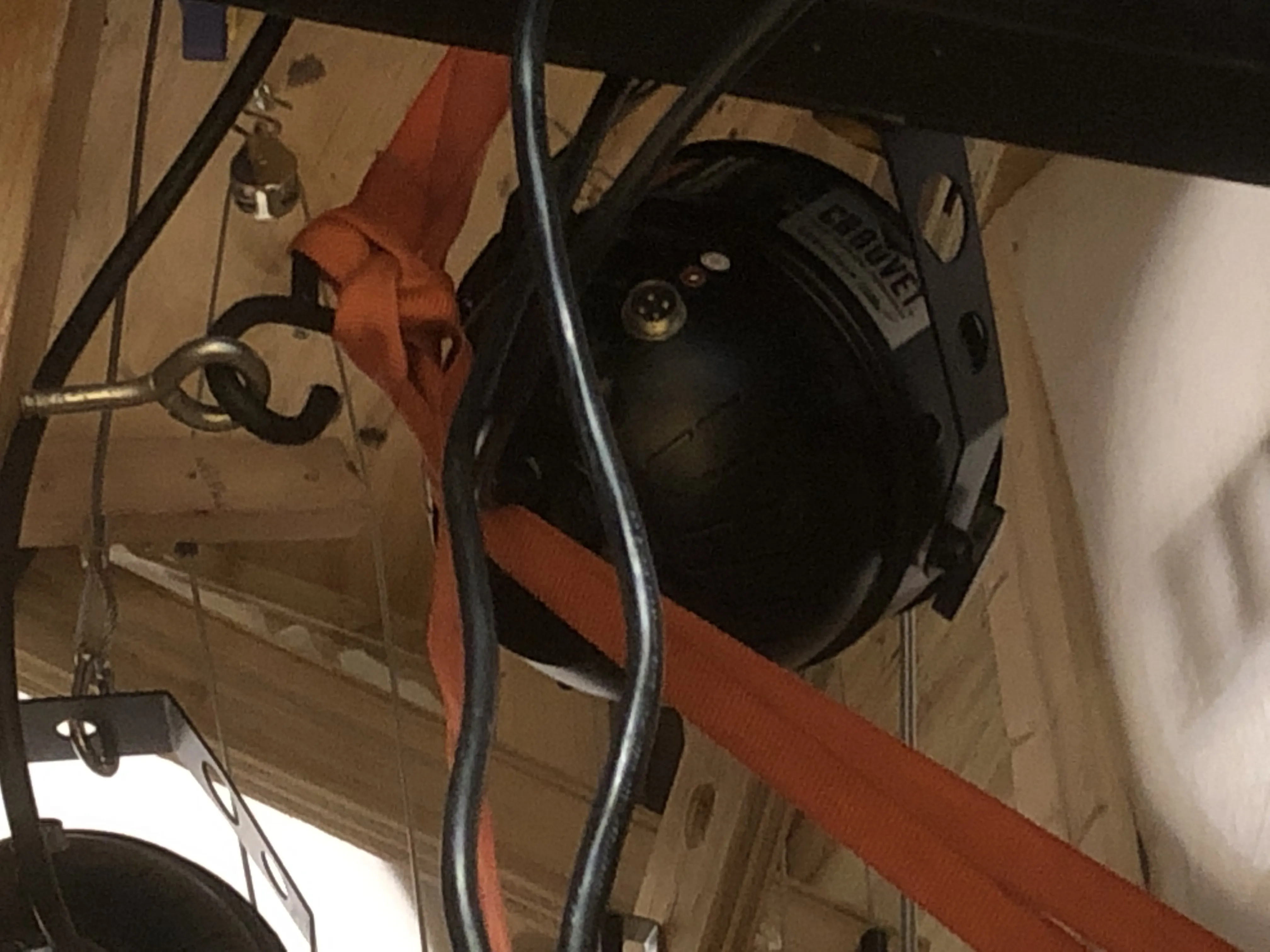 Inside the tower looking up — PAR can light mounted inside, cables visible