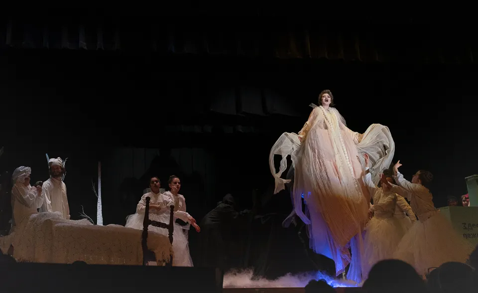 Fruma-Sarah hovering over the stage during the dream sequence