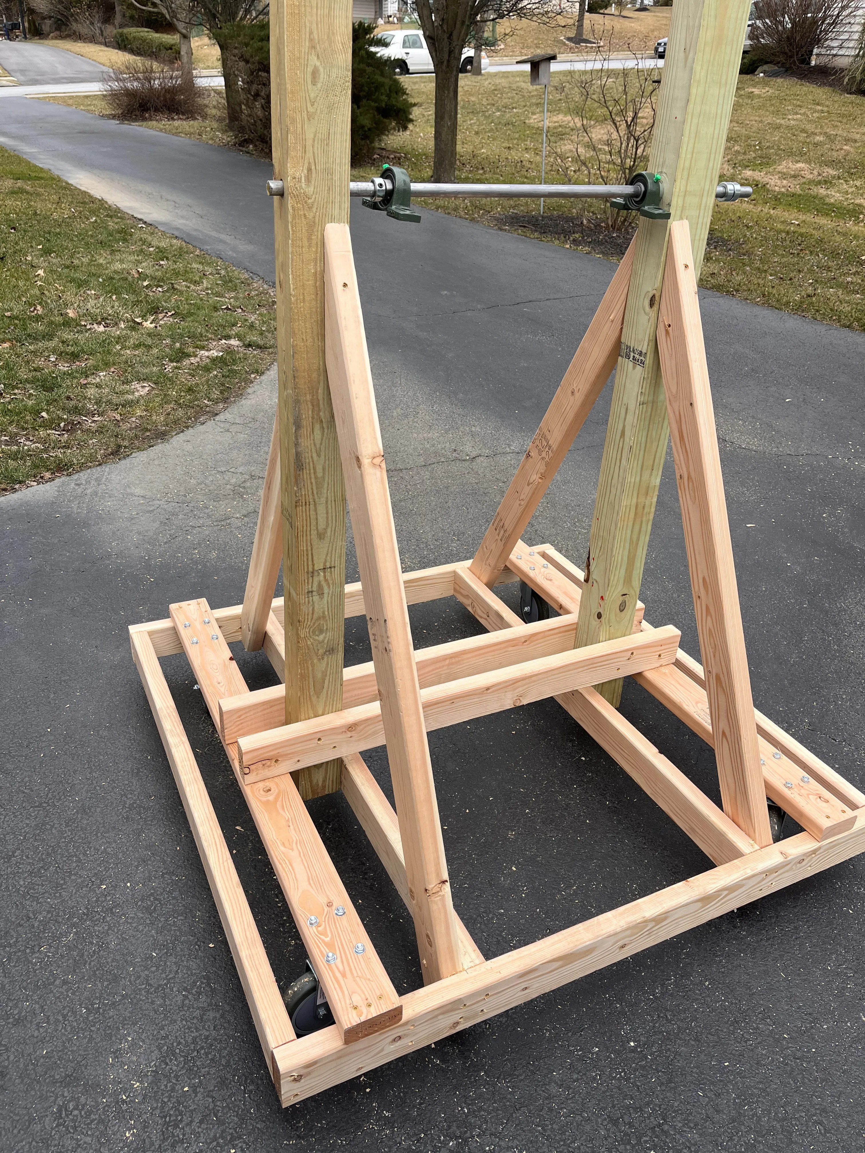 Close-up of the base showing the caster wheels and frame construction