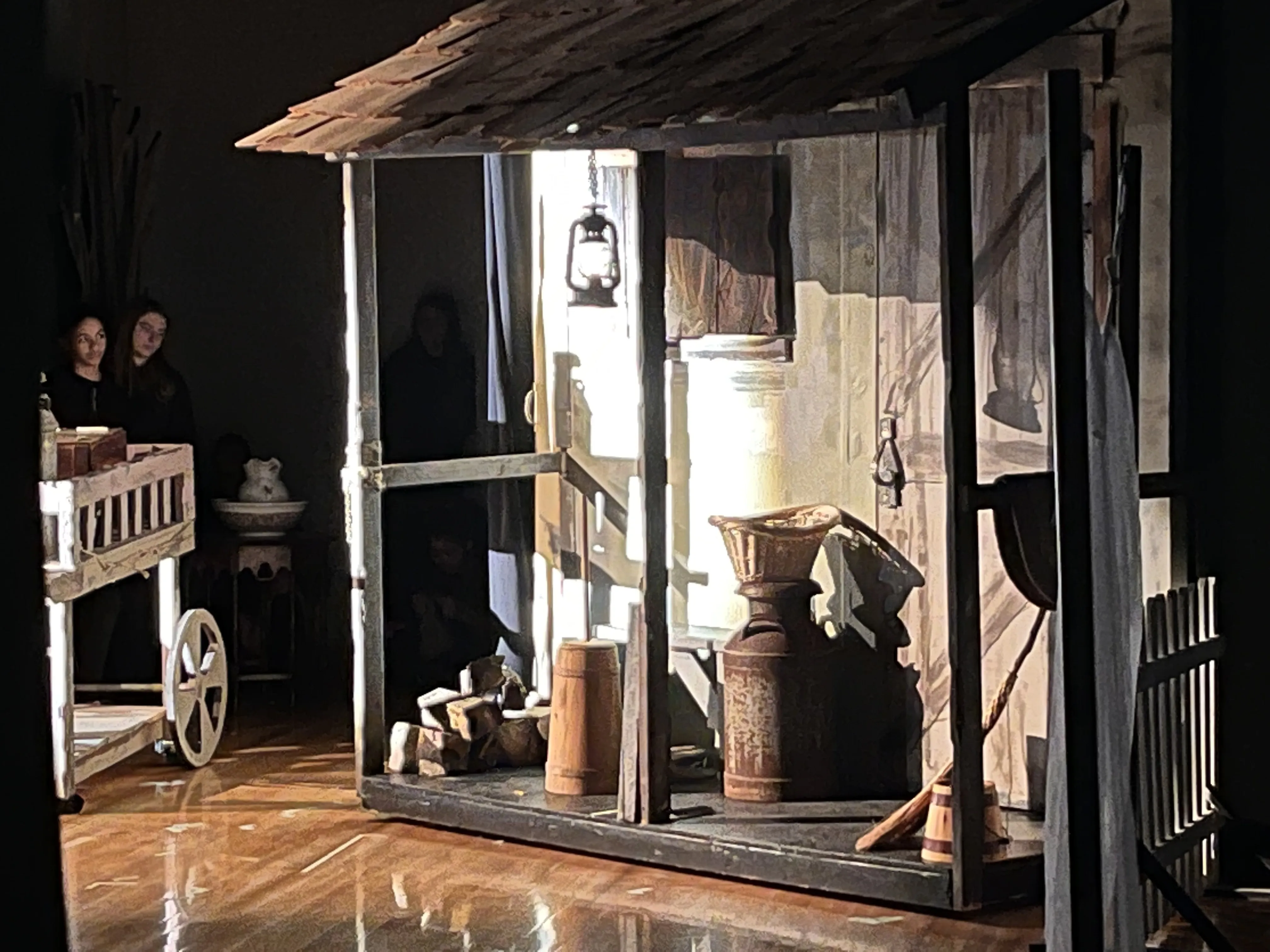 Tevye's house set piece on stage during the production