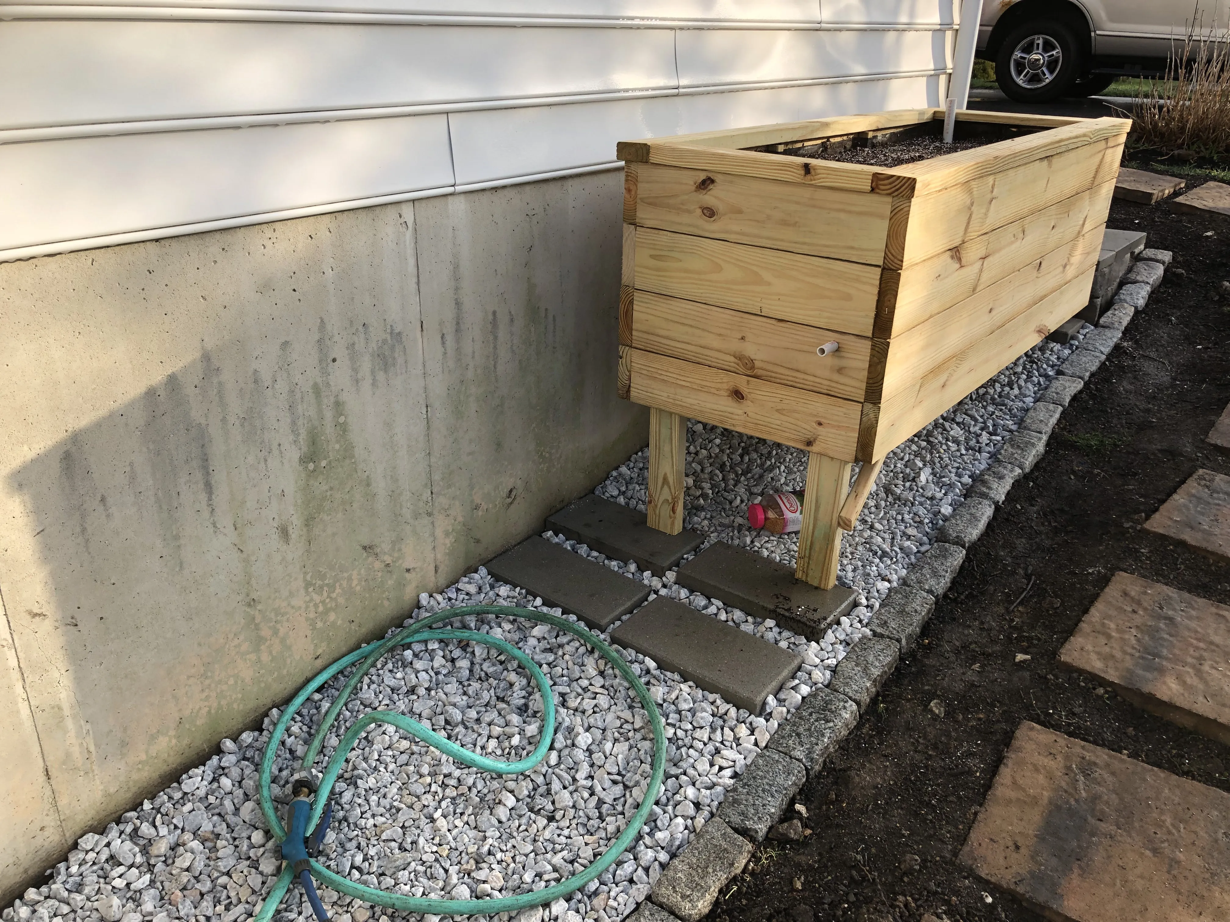End view of the bed showing the leg construction and gravel underneath