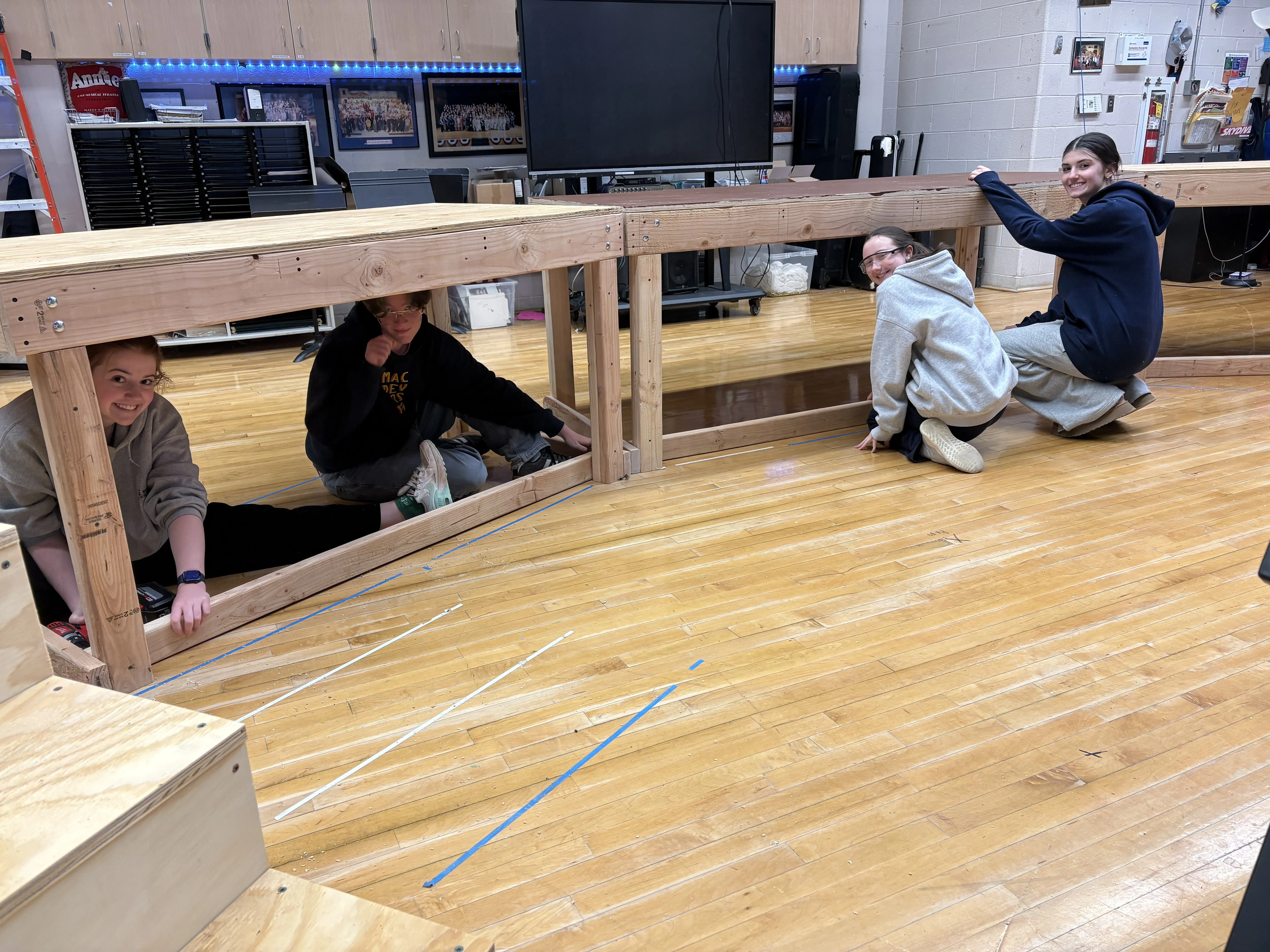 The crew helping fit the platform frames together