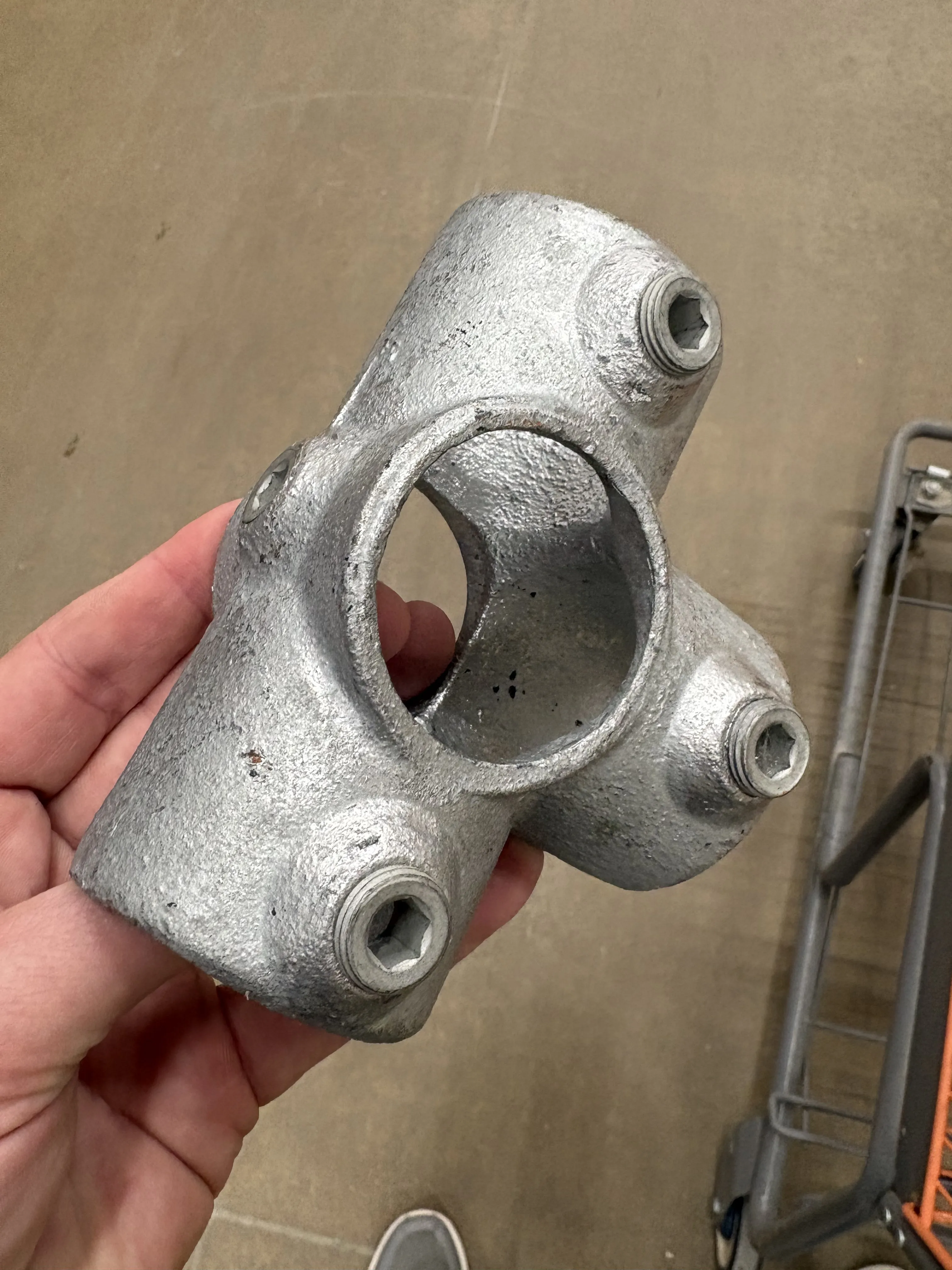 A Kee Klamp structural pipe fitting — the hardware that makes the railings look real