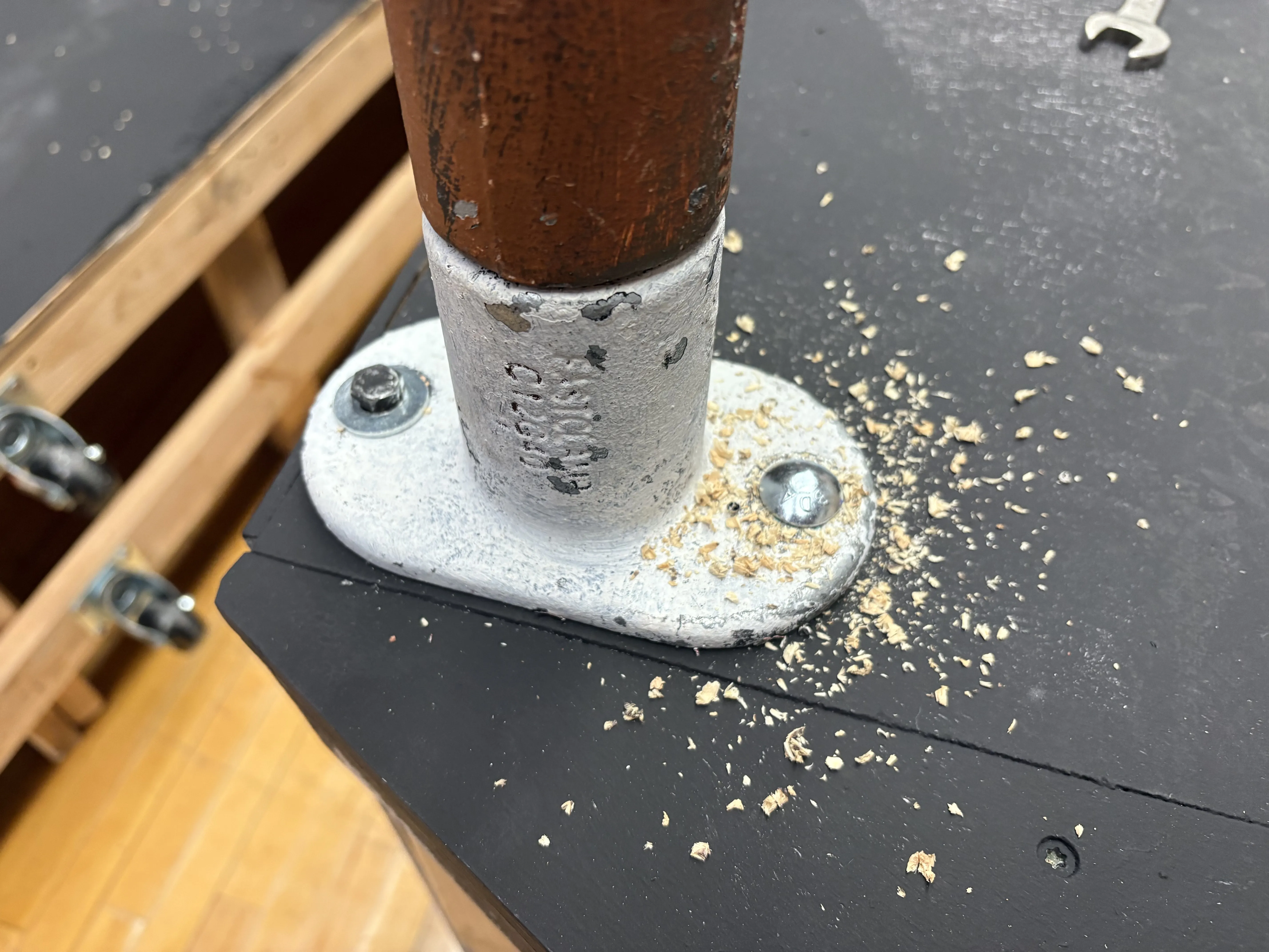 Floor flange bolted to the platform deck